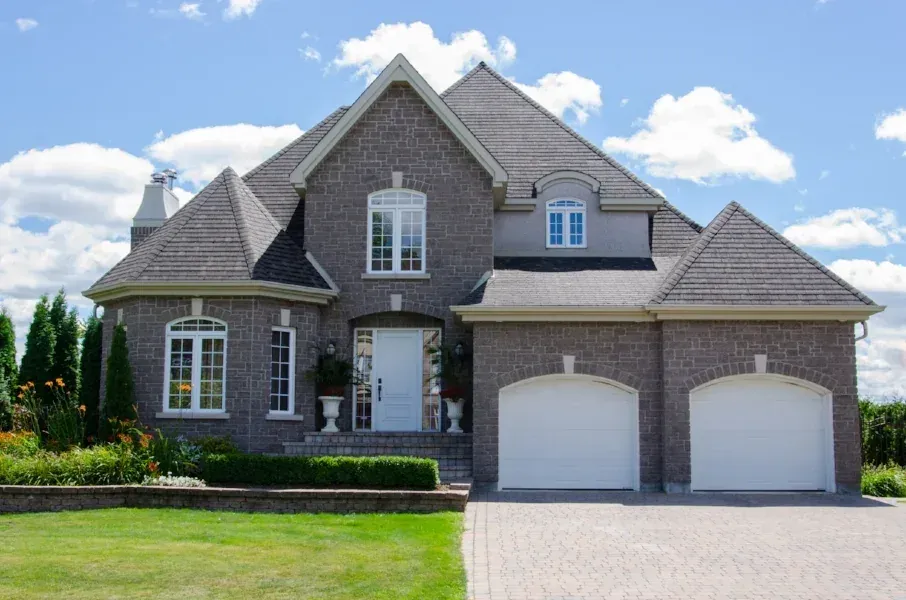 New build with double garage and stone detailing