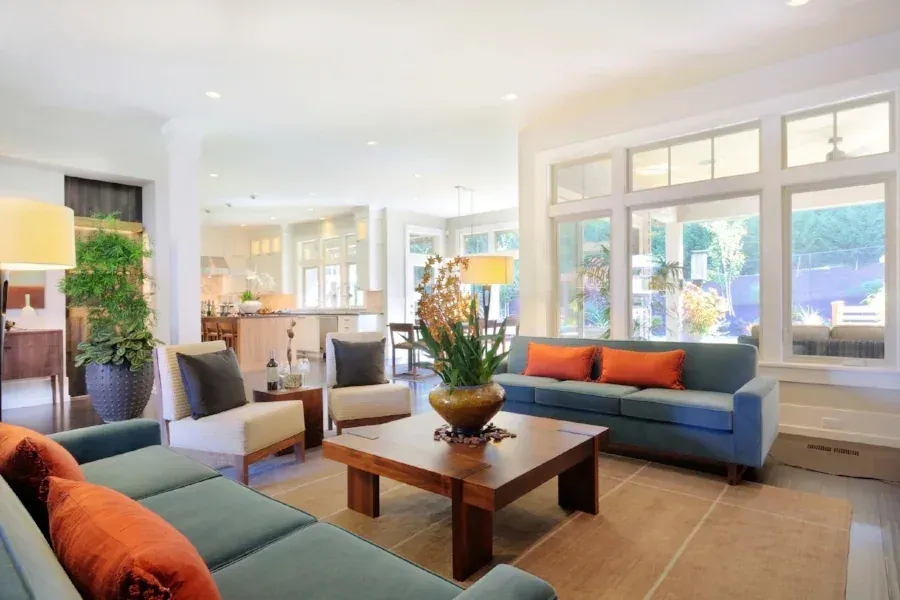 Remodeled living room with new flooring and finishes