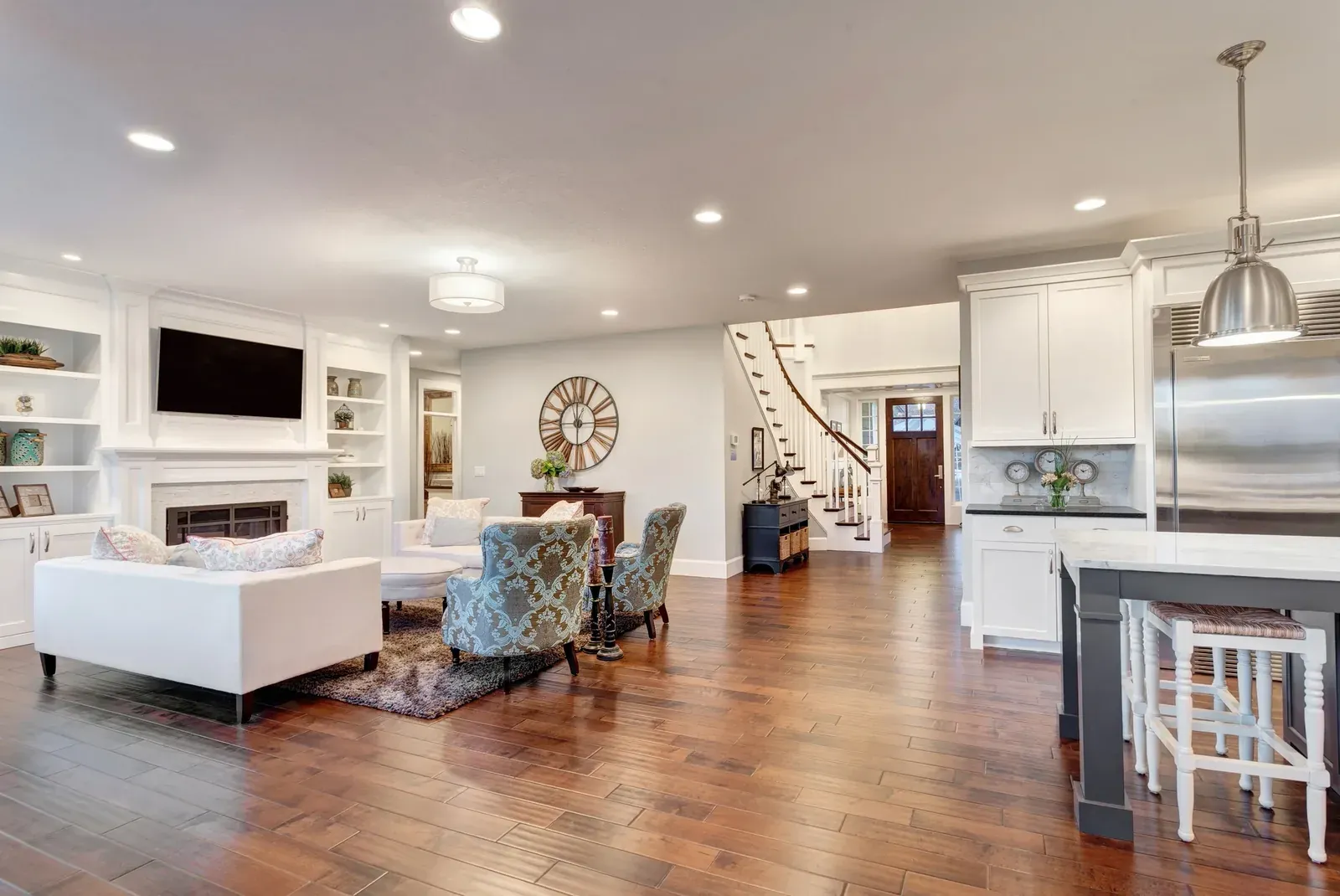 Open-plan living and kitchen space after remodeling