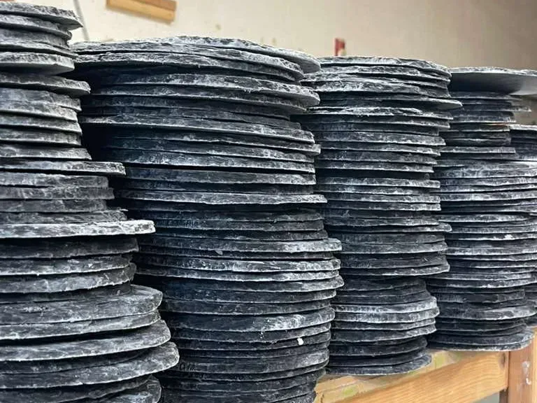 Stacks of slate tiles ready for a roof restoration